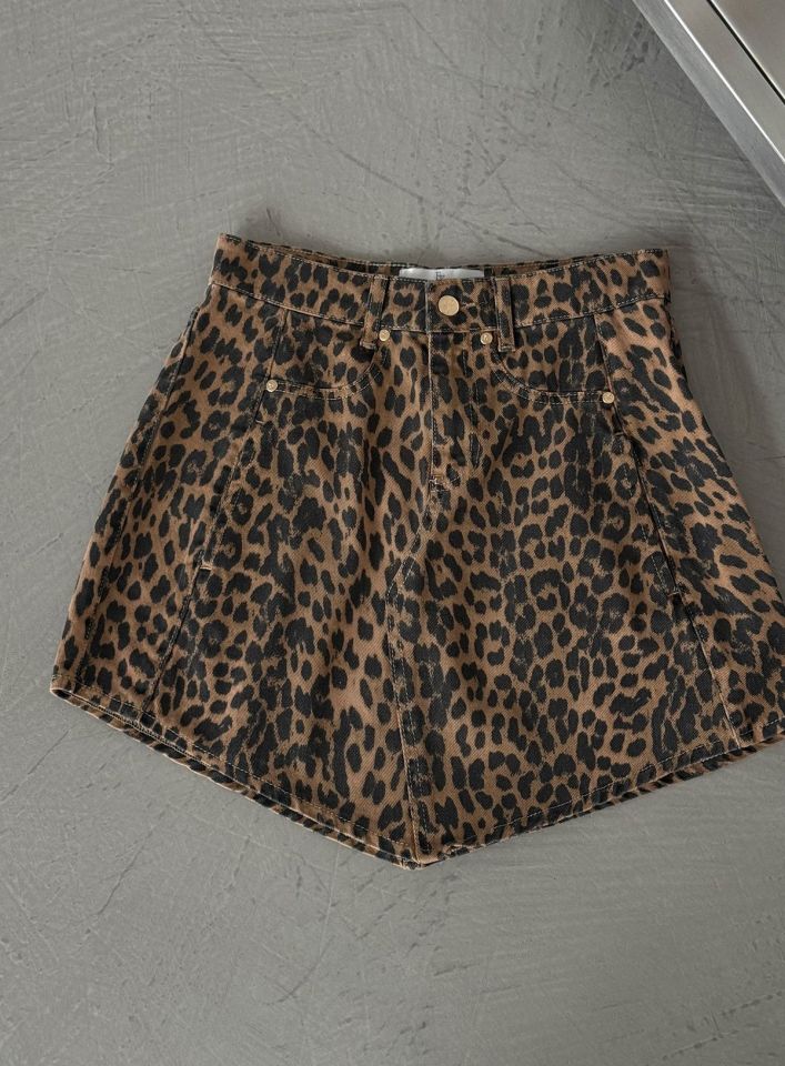 ASİMETRİK KESİM LEOPAR DENİM ETEK